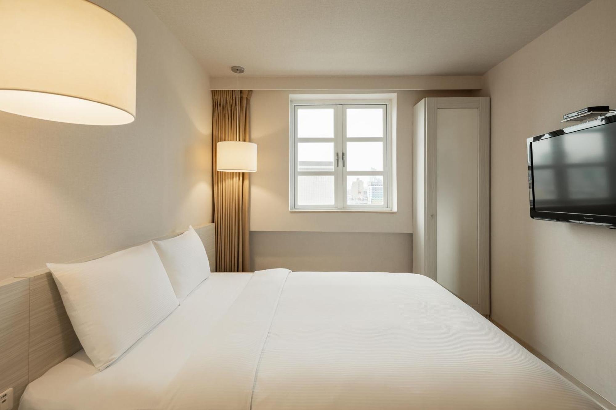 Kindness Hotel - Houyi Jiuru Kaohsiung Quarto foto