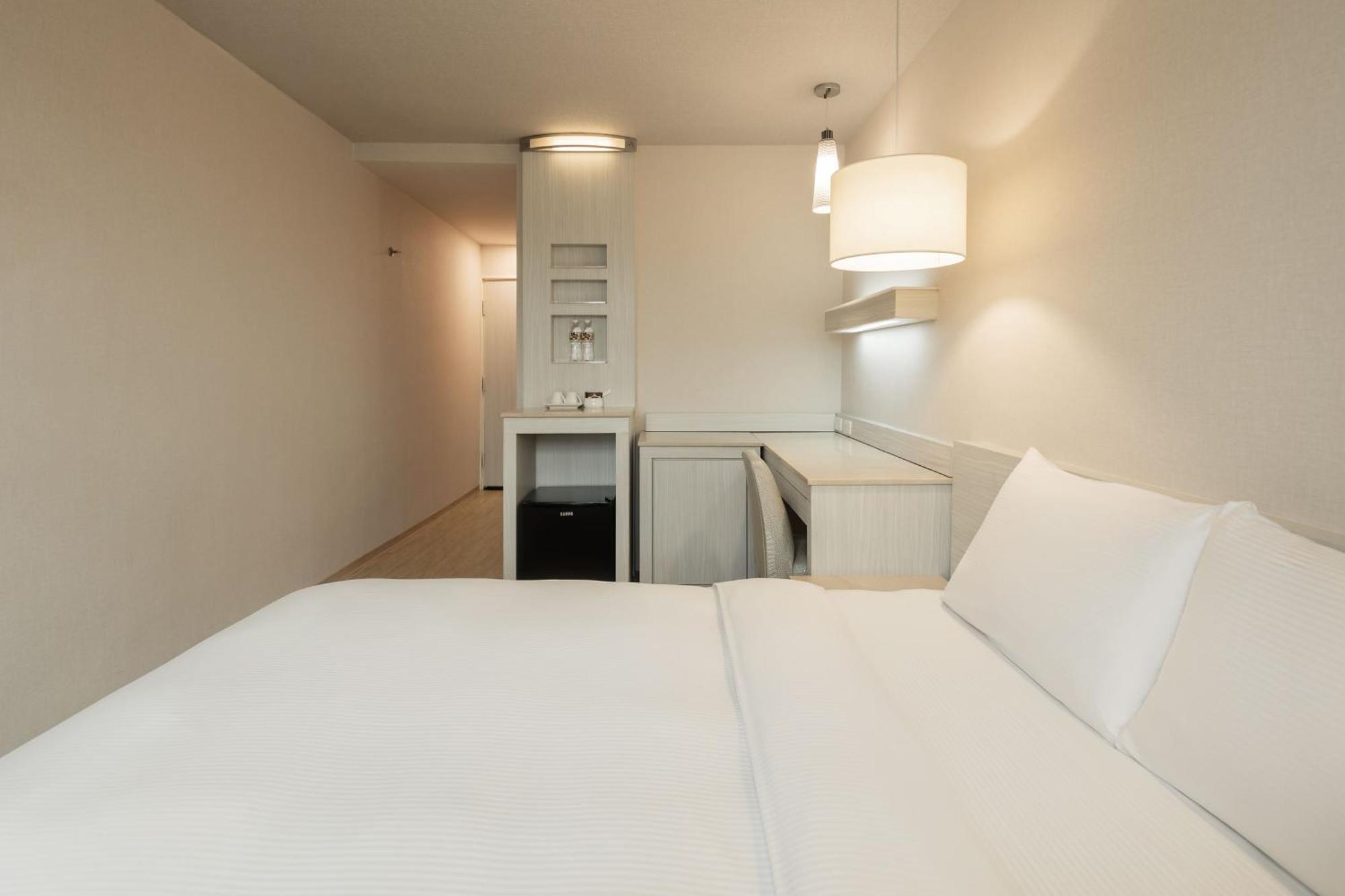 Kindness Hotel - Houyi Jiuru Kaohsiung Quarto foto