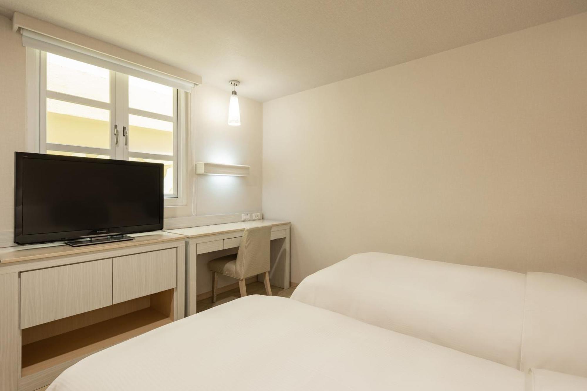 Kindness Hotel - Houyi Jiuru Kaohsiung Quarto foto